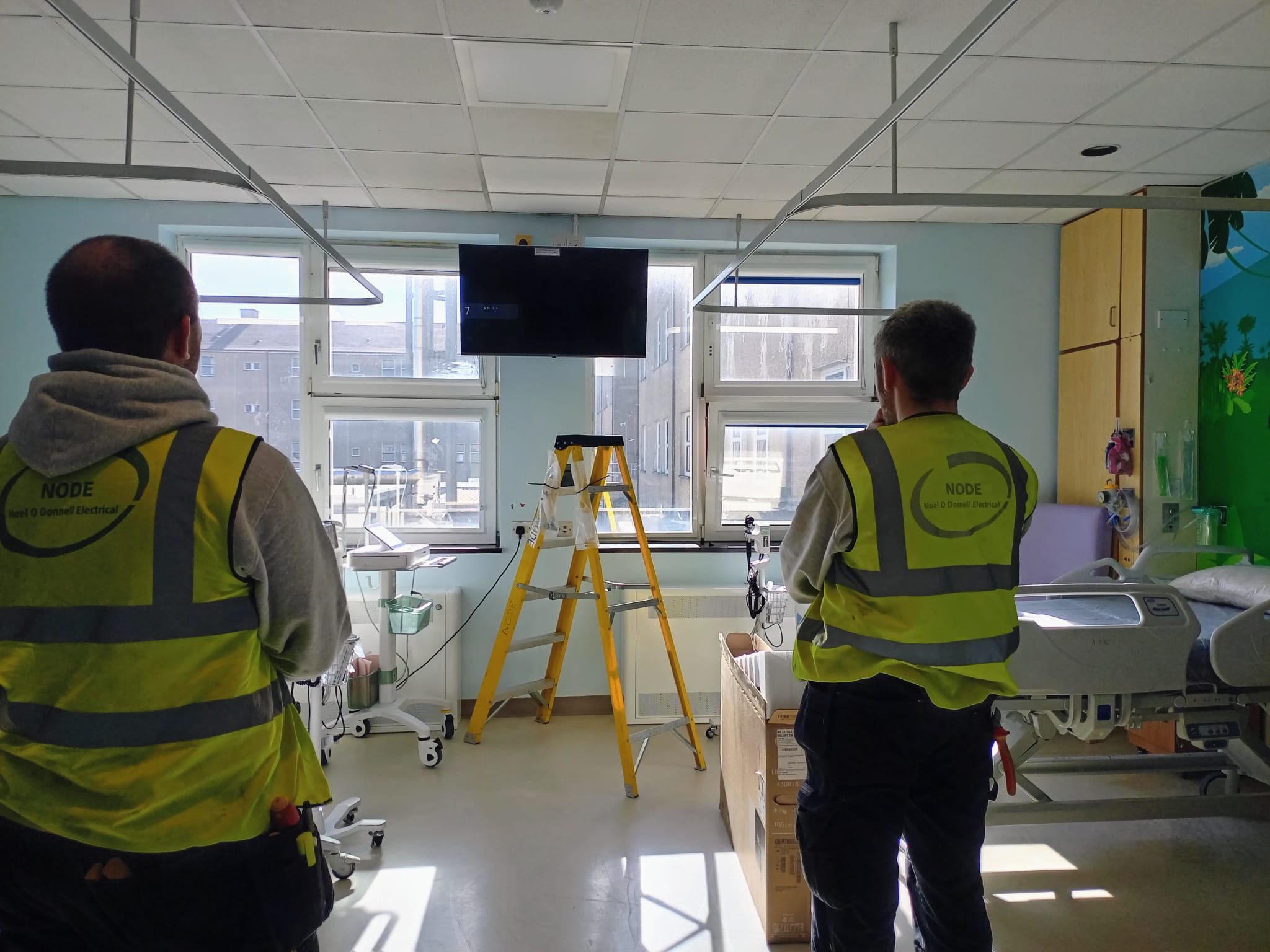 Installation of new televisions on The Childrens Ward, UHW.